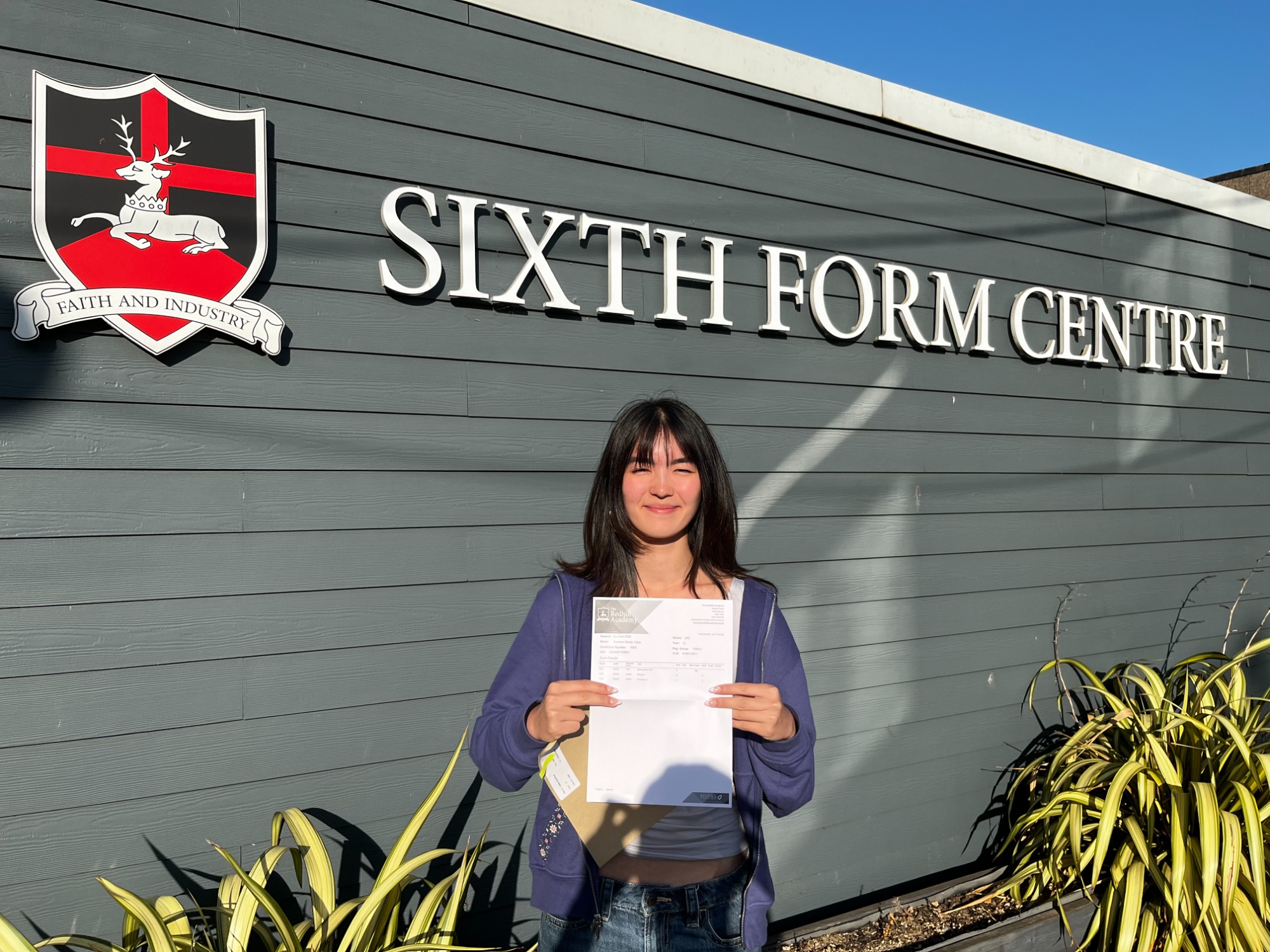 Summer receives her A Level results at The Redhill Academy Summer, who achieved A*AA, will be reading Veterinary Science at the University of Surrey.